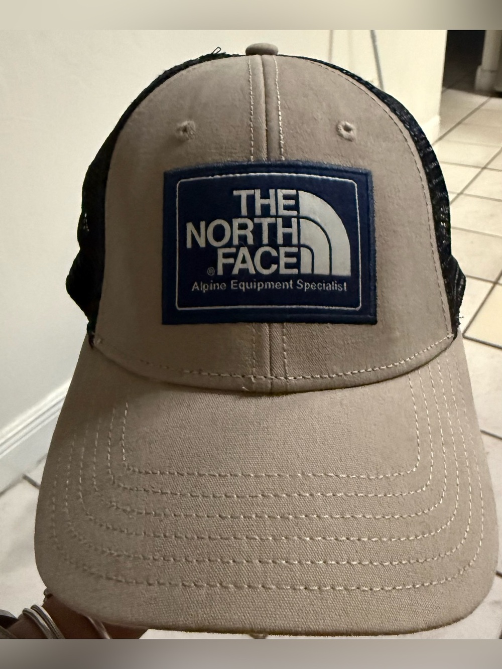 The North Face Beige Hat with Navy Logo Patch